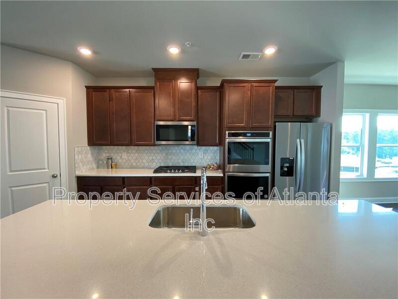 Woodstock - 4BR/3.5BA -TOWNHOUSE-GREAT SCHOOLS-INCLUDES LANDSCAPING. property image