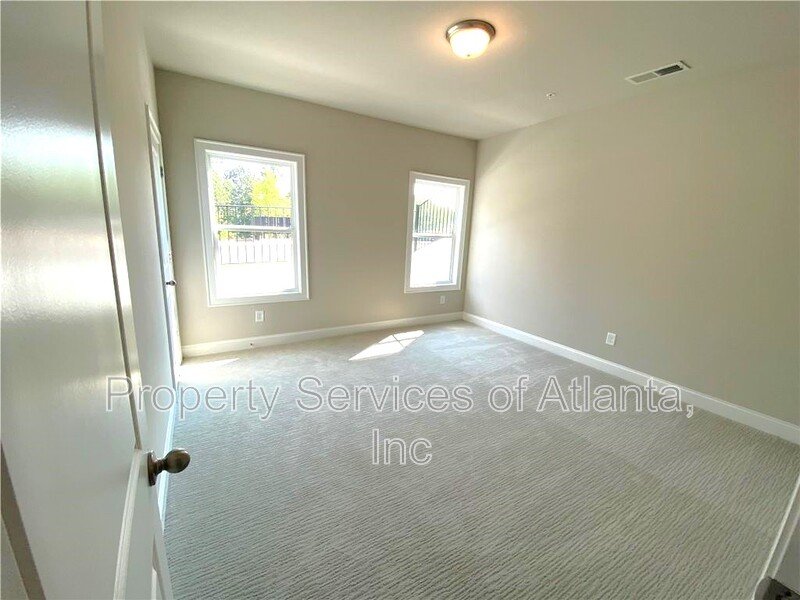 Woodstock - 4BR/3.5BA -TOWNHOUSE-GREAT SCHOOLS-INCLUDES LANDSCAPING. property image