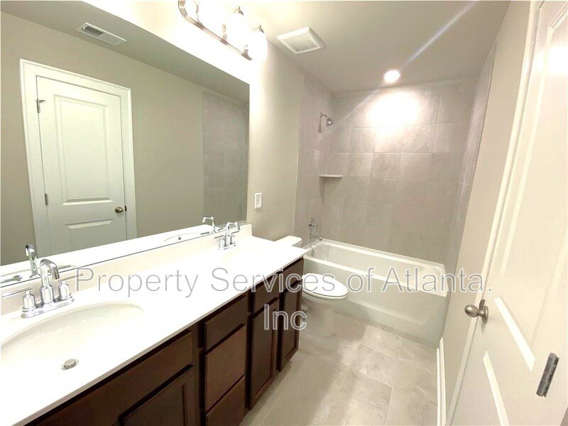 Woodstock - 4BR/3.5BA -TOWNHOUSE-GREAT SCHOOLS-INCLUDES LANDSCAPING. property image