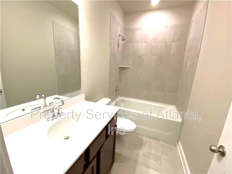 Woodstock - 4BR/3.5BA -TOWNHOUSE-GREAT SCHOOLS-INCLUDES LANDSCAPING. property image